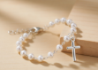 silver plated pearl cross charm bracelet