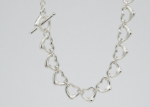 silver plated hollow heart toggle bracelet